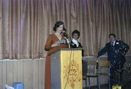 Iona Campagnolo speaks at podium during 25th Birthday event for the city of Kitimat