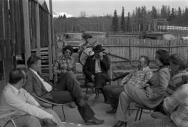 Minister Jack Horner, Bill Campbell, Iona Campagnolo and others meeting outside in Smithers