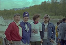 Iona Campagnolo, Kitimat Mayor George Thom, past Exalted Ruler of the Kitimat Elks, and man at Kitimat River bank for Delta King Days
