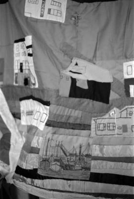 Quilt tapesetry entitled "Community Panorama"