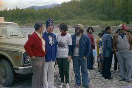 Iona Campagnolo, Mayor George Thom, past Exhalted Ruler of the Kitimat Elks, and unidentified man on Kitimat River Bank
