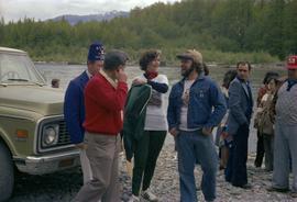 Iona Campagnolo, Mayor George Thom, past Exhalted Ruler of the Kitimat Elks, and unidentified man on Kitimat River Bank