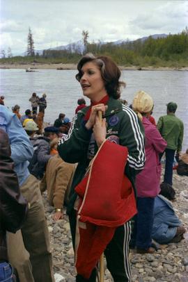 Iona Campagnolo stands on river bank during "Delta King Days" raft race event