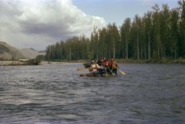 Iona Campagnolo and four unidentified men paddling raft on Kitimat River