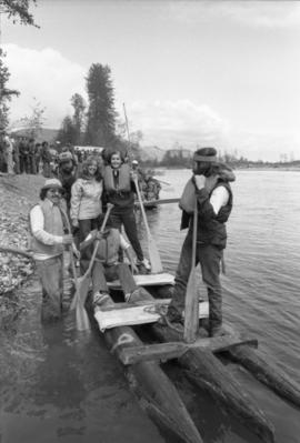 Iona Campagnolo and others stand on raft during Kitimat Delta King raft race