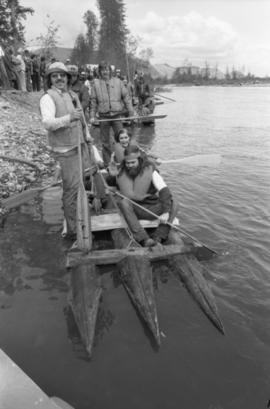 Iona Campagnolo sits on raft with others during Kitimat Delta King raft race