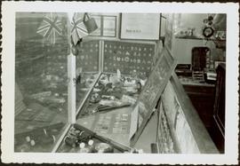 James Joseph Claxton’s badge collection in the window of Roderick Jewelers, New Westminster