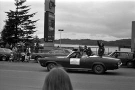Iona Campagnolo waves from convertable in Prince Rupert Sea Festival Parade