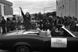 Iona Campagnolo waving from convertible in Prince Rupert Sea Festival Parade