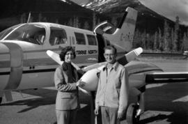 Iona Campagnolo with Brian Pewsey in front of Trans North Plane in Cassiar