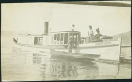 Two Women aboard Small Steamboat