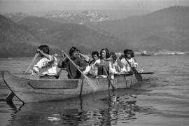 Iona Campagnolo paddling with Grizzlies canoe team near Kitimat