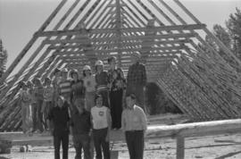Group portrait of Iona Campagnolo with construction workers, possibly for a Young Canada Works project