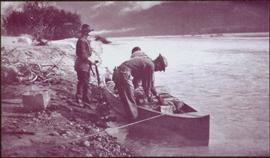 Taku River Survey - Men Loading Canoe