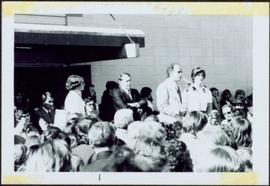 Pierre Trudeau and Iona Campagnolo speak to crowd together at microphone