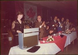 M.P. Iona Campagnolo giving speech at reception in Jeanne Sauvé’s riding, Ahuntsic, late 1974