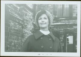 Close View of M.P. Iona Campagnolo wearing a coat and toque, standing in front of parliament buil...