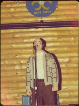 Unidentified man speaks during tour to bring television access from Yukon to Atlin, 1977