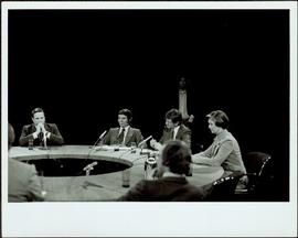 Minister Iona Campagnolo and Hugh Faulkner seated with others at a media ‘Round Table,’ 1977