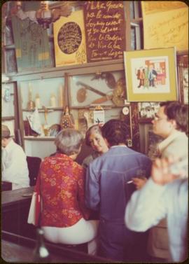 Ministry of Sport Tour - Minister Iona Campagnolo speaks to unidentified woman and man in La Bodeguita, Havana, Cuba