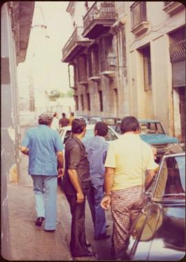 Ministry of Sport Tour - Chuck Pilford and the Secret Service?standing in street in Havana, Cuba