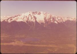 Skeena Riding tour - Aerial shot of lake with mountains in background