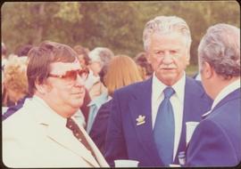 Commonwealth Games, Edmonton 1978 - Three unidentified men stand in front of crowd
