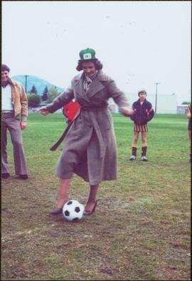 Iona Campagnolo performs the kickoff in heels and a DMJ Kickers hat at junior soccer tournament, ...