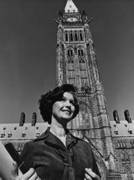 Iona Campagnolo standing in front of Peace Tower in Liberal publicity portrait