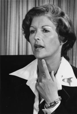 Iona Campagnolo wearing bracelet with Canadian and Austrian flags in Liberal publicity image for East Germany delegation