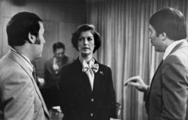Iona Campagnolo speaking with unknown men