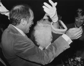 Prime Minister Pierre Trudeau and Iona Campagnolo dressed as Santa Claus