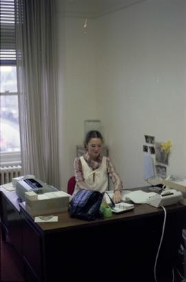 Woman behind desk in Iona Campagnolo's office