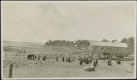 Funeral party on beach at Metlakatla, BC