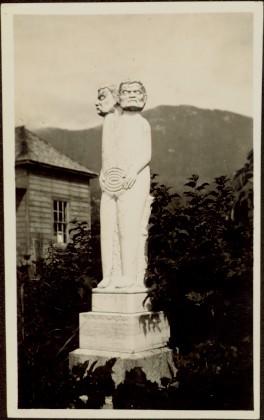Statue and headstone of grave at Port Simpson, BC