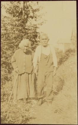 Haida man and woman walking in Masset, Queen Charlotte Islands, BC