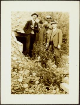H.F. Glassey with Men at Mine Adit 