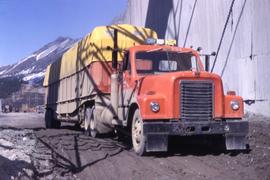 Truck transporting packaged asbestos