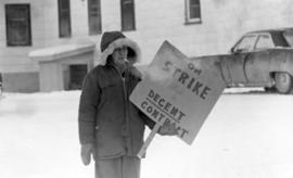 Worker holding "On Strike for a Decent Contract" sign during the 1970 U.S.W.A. Local 65...