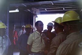 Prime Minister Trudeau speaking with men in hardhats