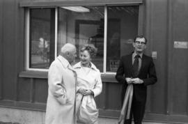 Alice Gritzuk and two unknown men at building dedication