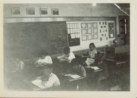 Division II children working at their desks at Giscome School