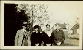 H.F. Glassey with Men in Military Uniforms
