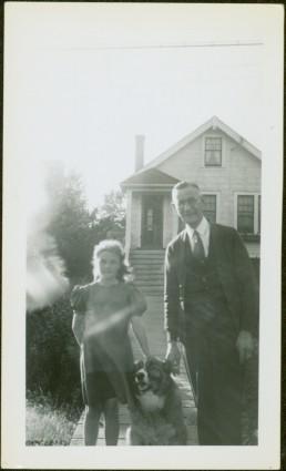 H.F. Glassey & Unknown Girl with Dog