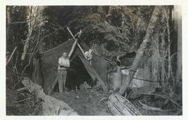 Man standing in front of a tent