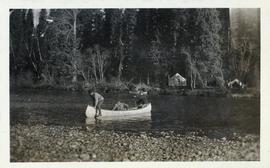 Man beaching a canoe