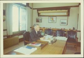 Ray Williston at his desk