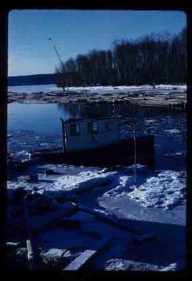 Woods Division - Lake Operations - Tug boat at Michelle Bay in winter
