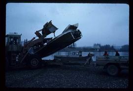 Woods Division - Riverboat Operations - Loading boats on trailers