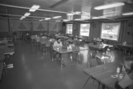 Workplace Album - Man Seated in Dining Room